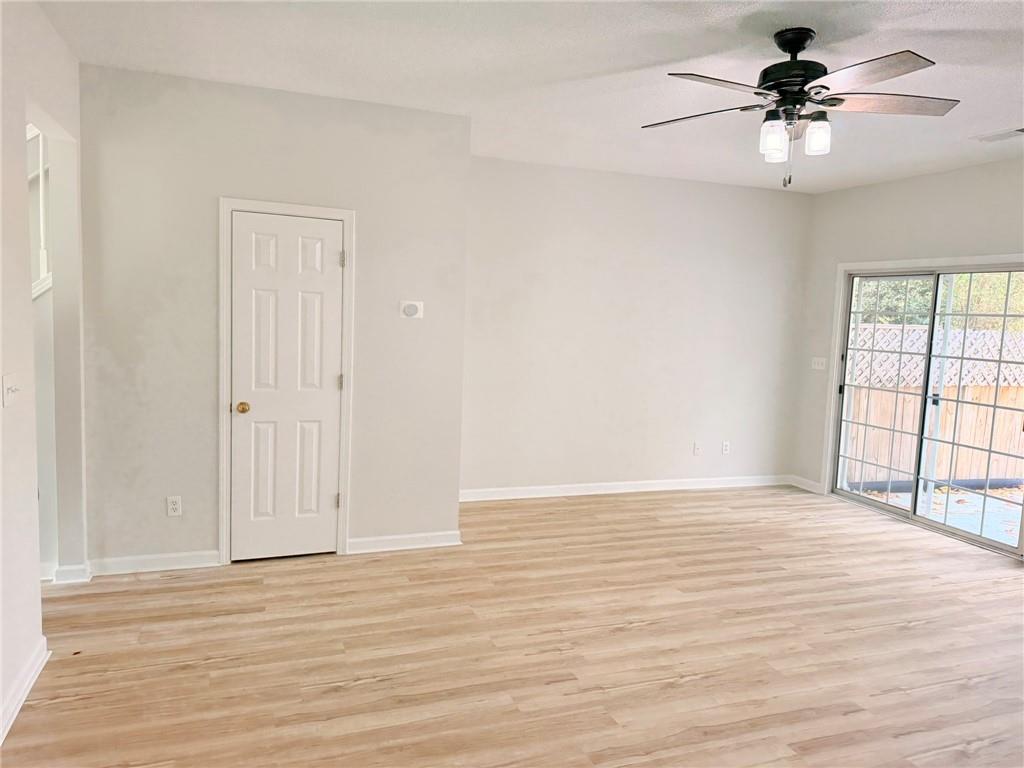 10900 Wittenridge Drive, Unit C7 Alpharetta, GA 30022 - Photo 12 of 31 a view of an empty room with a window