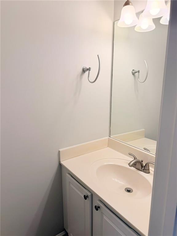 10900 Wittenridge Drive, Unit C7 Alpharetta, GA 30022 - Photo 13 of 31 a bathroom with a sink and a mirror