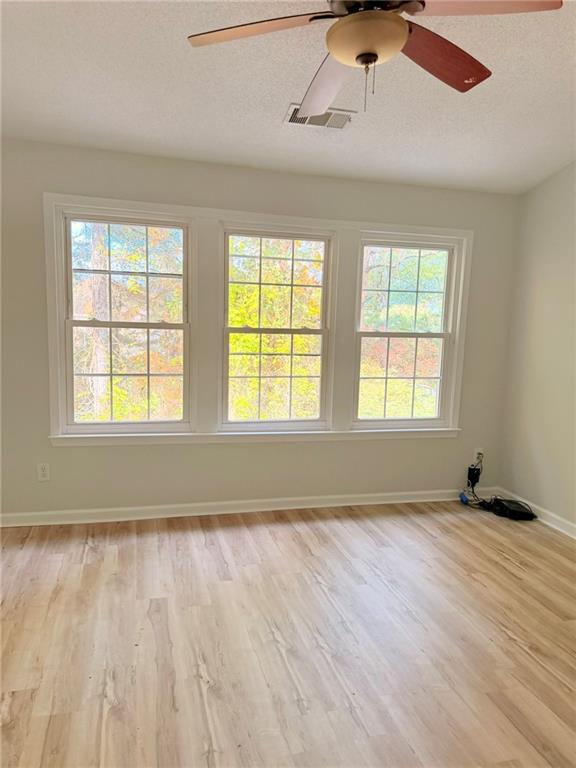 10900 Wittenridge Drive, Unit C7 Alpharetta, GA 30022 - Photo 18 of 31 a view of an empty room with a window