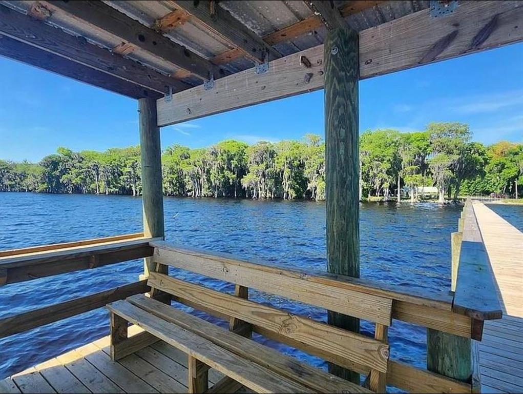 731 Paradise Boulevard Georgetown, FL 32139 - Photo 11 of 15 a view of deck with wooden floor and outdoor space