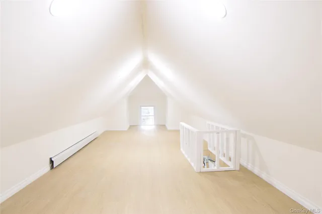 a view of empty room with windows