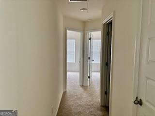 11899 Conrad Circle Hampton, GA 30228 - Photo 19 of 30 a view of a hallway with a bathroom
