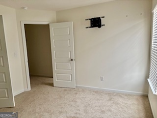 11899 Conrad Circle Hampton, GA 30228 - Photo 27 of 30 an empty room with windows