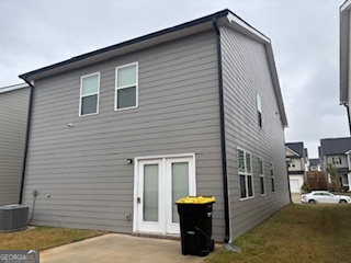 11899 Conrad Circle Hampton, GA 30228 - Photo 30 of 30 a view of a house with a patio