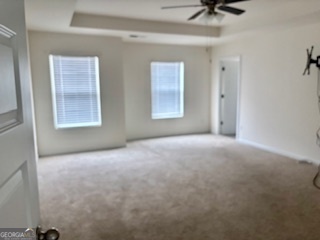 11899 Conrad Circle Hampton, GA 30228 - Photo 9 of 30 a view of an empty room with a window