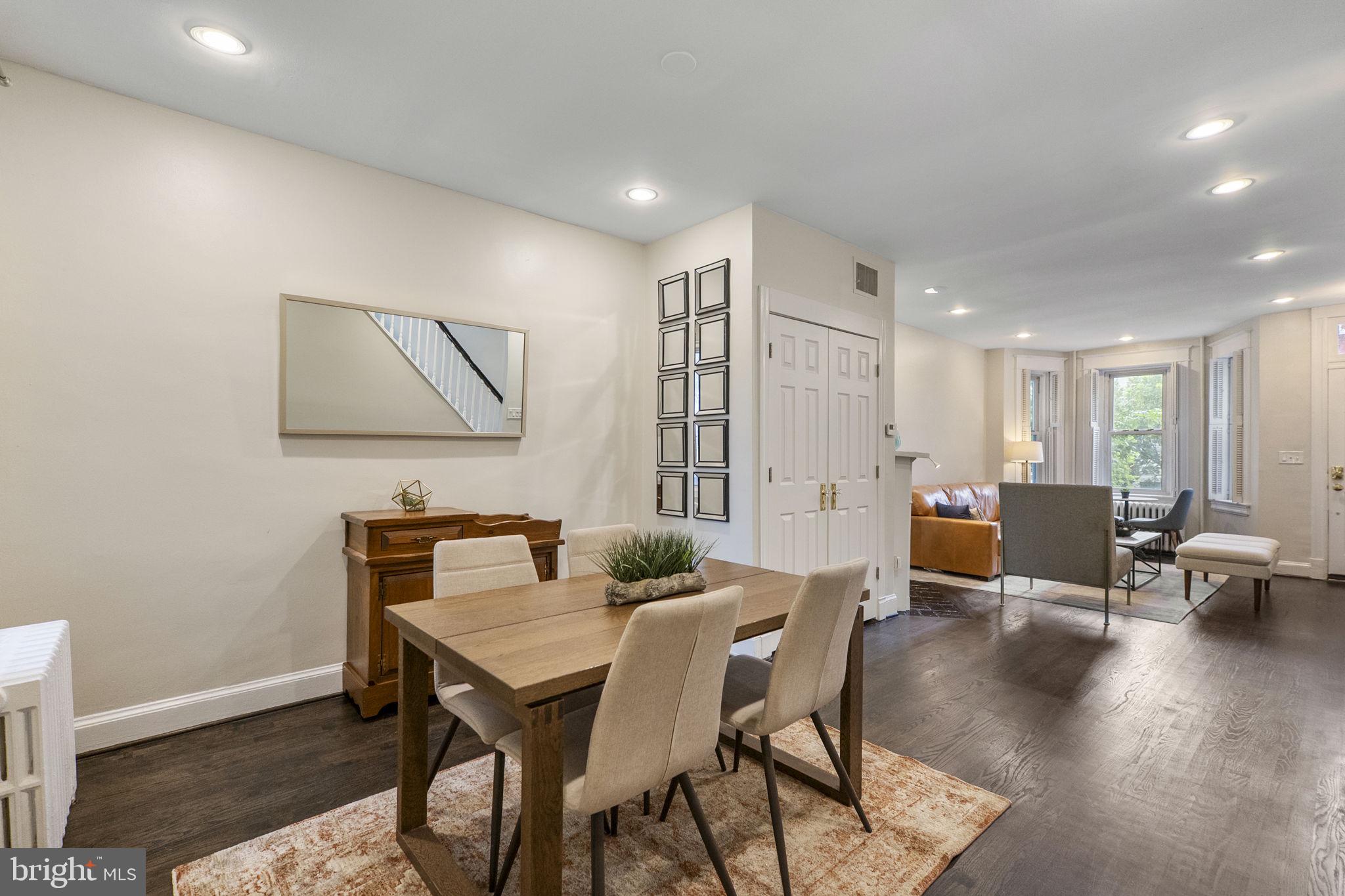 145 D Street Southeast Washington, DC 20003 - Photo 10 of 44 a view of a dining room with furniture and wooden floor