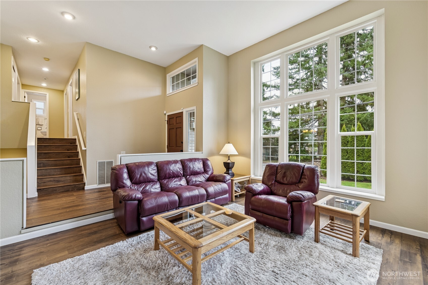 2830 196th Street Southeast Bothell, WA 98012 - Photo 2 of 18 a living room with furniture and a large window