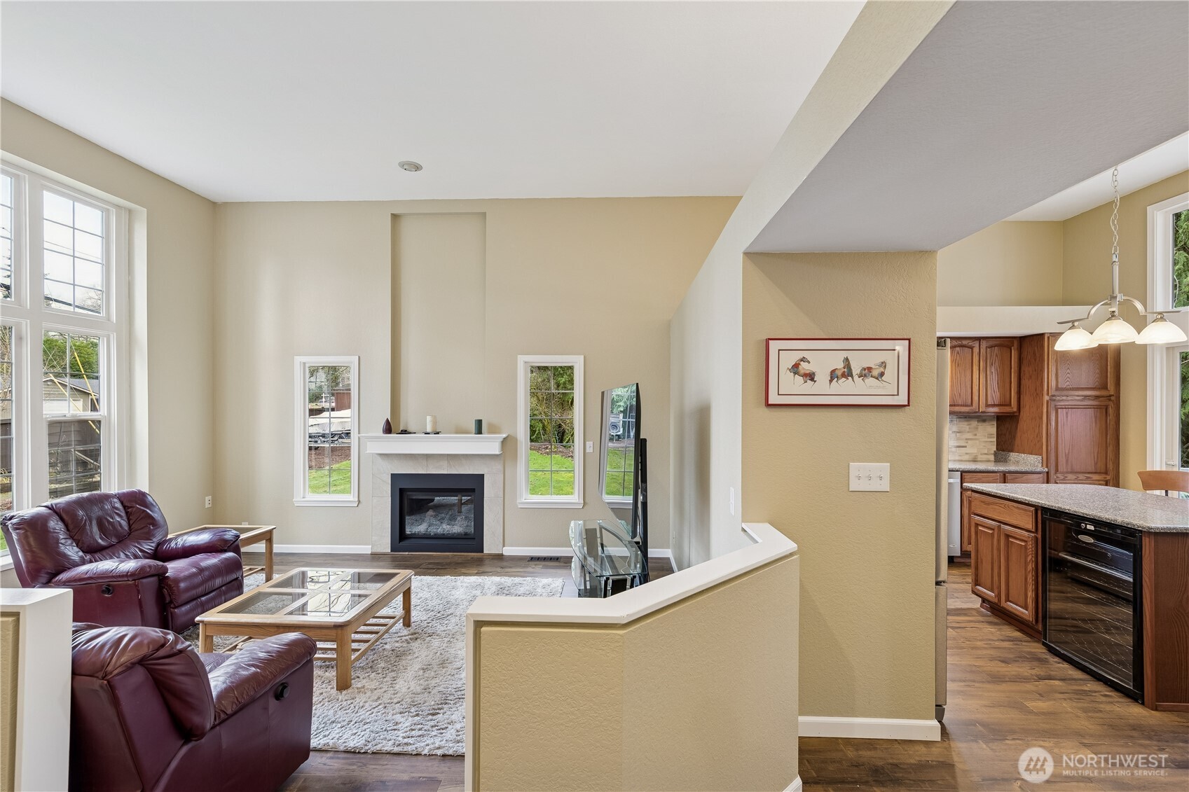 2830 196th Street Southeast Bothell, WA 98012 - Photo 3 of 18 a living room with furniture and a fireplace