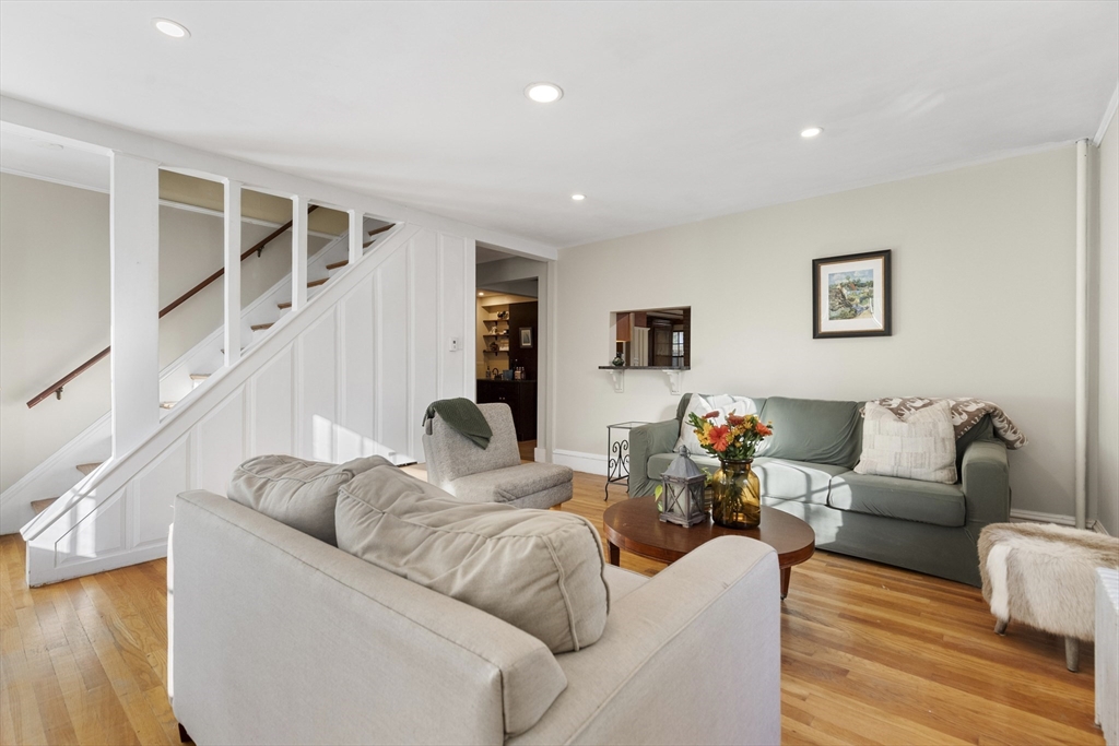 34 Chestnut Street Danvers, MA 01923 - Photo 13 of 33 a living room with furniture and a wooden floor
