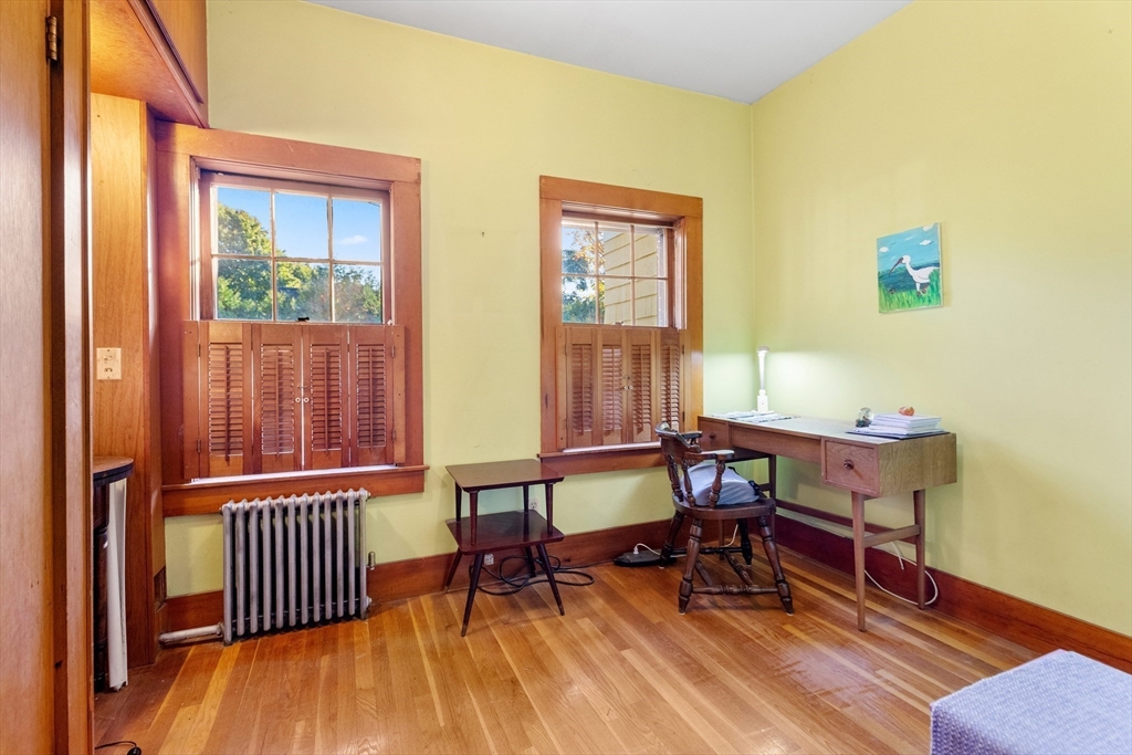 34 Chestnut Street Danvers, MA 01923 - Photo 20 of 33 a view of a livingroom with furniture and wooden floor