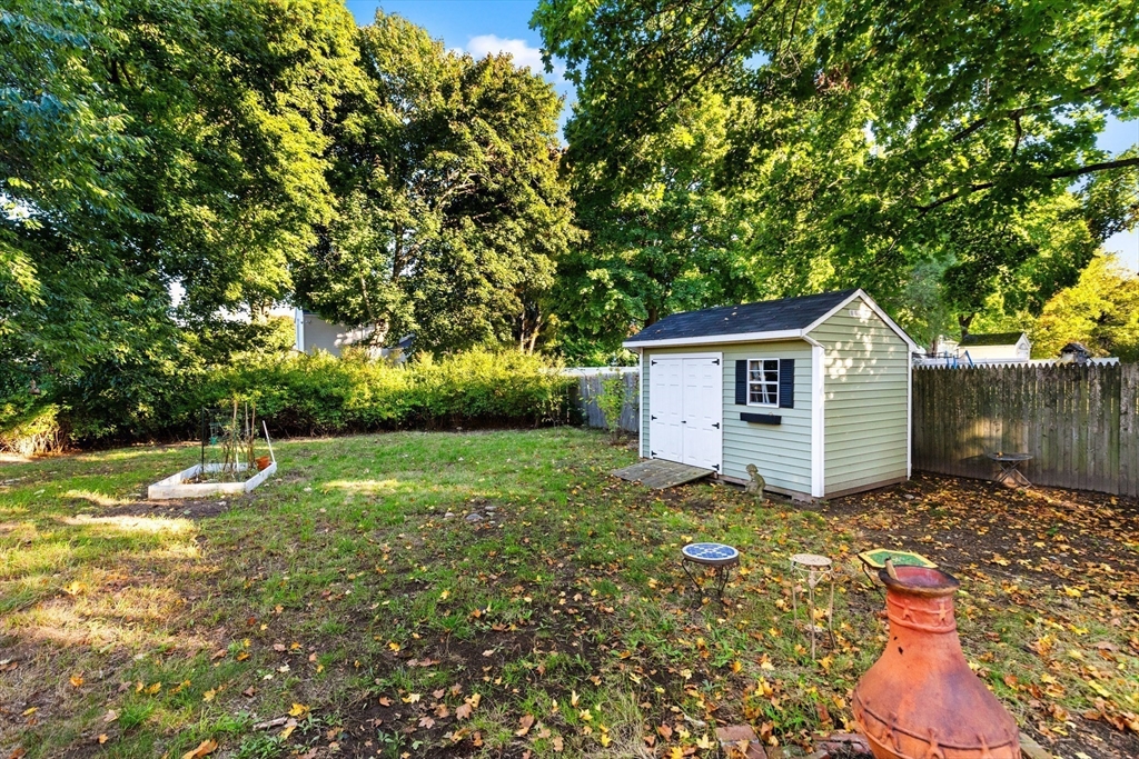 34 Chestnut Street Danvers, MA 01923 - Photo 28 of 33 a view of a house with yard and a tree