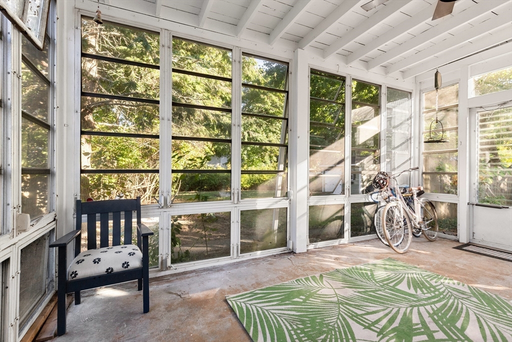 34 Chestnut Street Danvers, MA 01923 - Photo 29 of 33 a bedroom with furniture and a large window