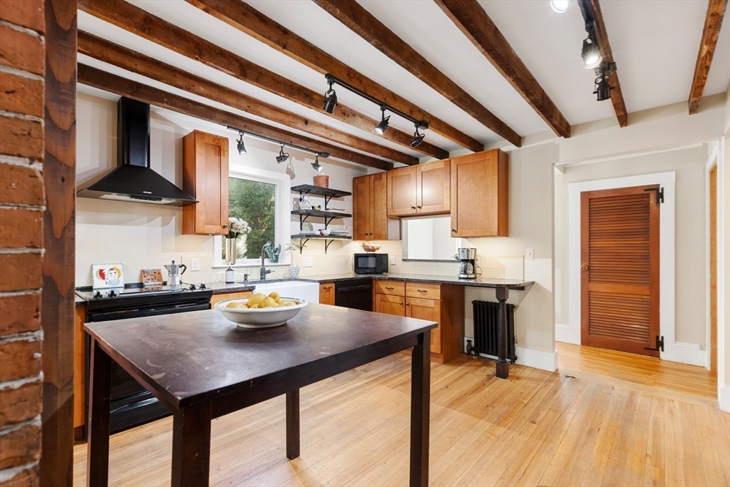 34 Chestnut Street Danvers, MA 01923 - Photo 3 of 33 a kitchen with a sink appliances and cabinets