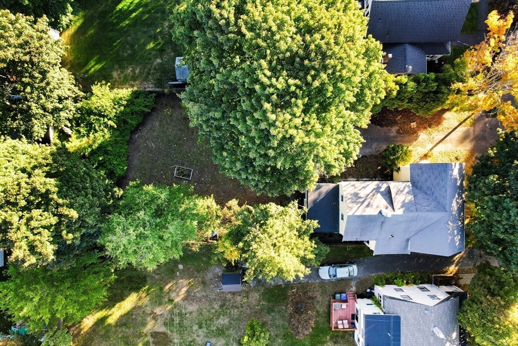 34 Chestnut Street Danvers, MA 01923 - Photo 31 of 33 an aerial view of a house with a yard