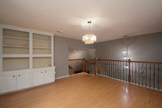 a garden with flowers and trees