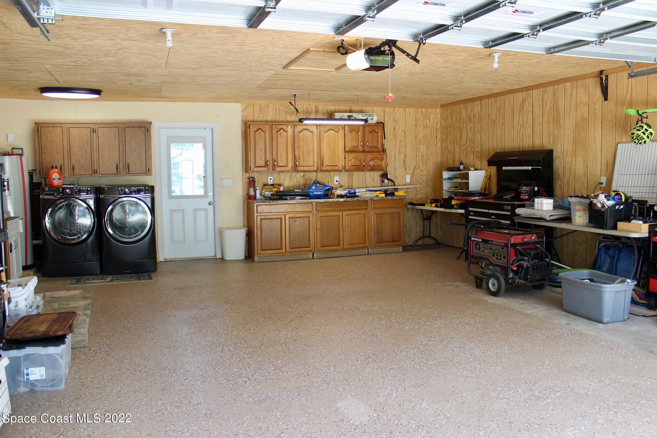 3665 Burkholm Road Mims, FL 32754 - Photo 38 of 62 a room with storage and utility