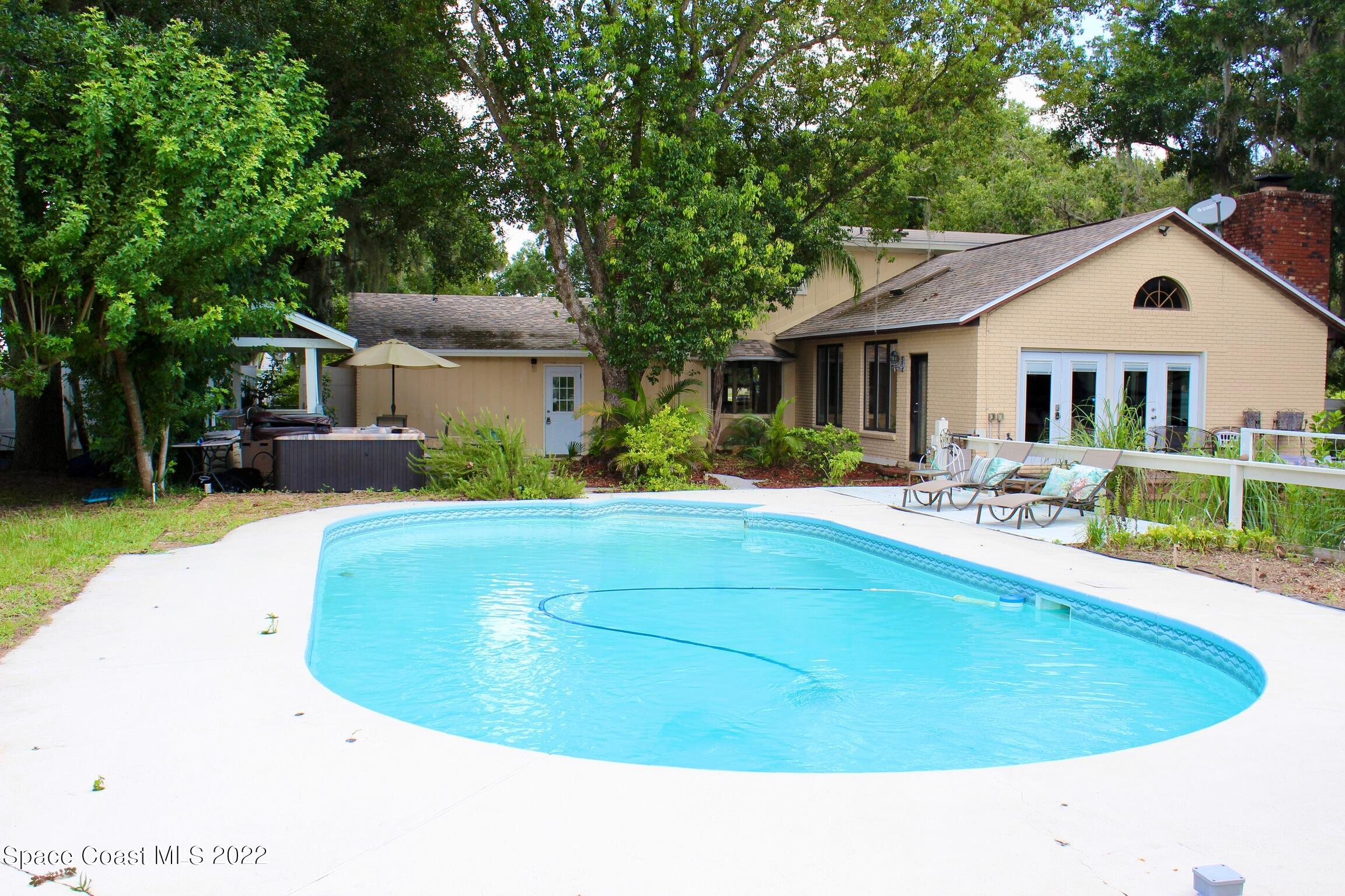 3665 Burkholm Road Mims, FL 32754 - Photo 48 of 62 a house view with a outdoor space