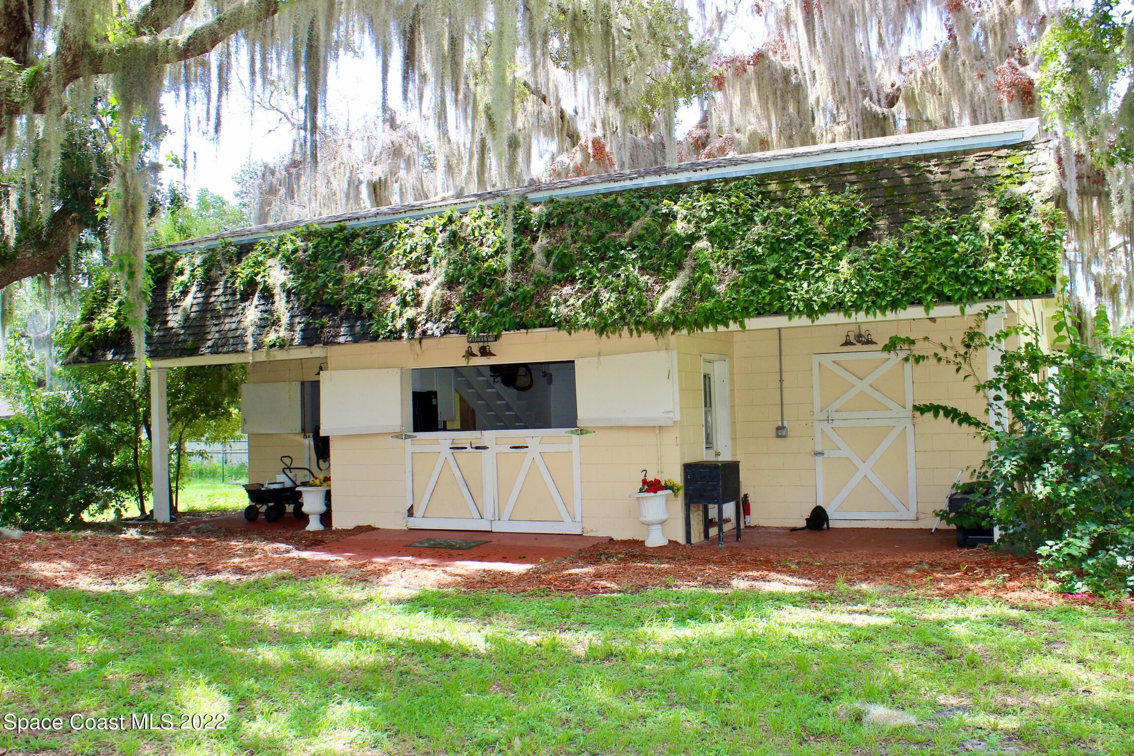 3665 Burkholm Road Mims, FL 32754 - Photo 57 of 62 a view of outdoor space yard and patio