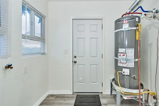 a view of room with window and lounge chair
