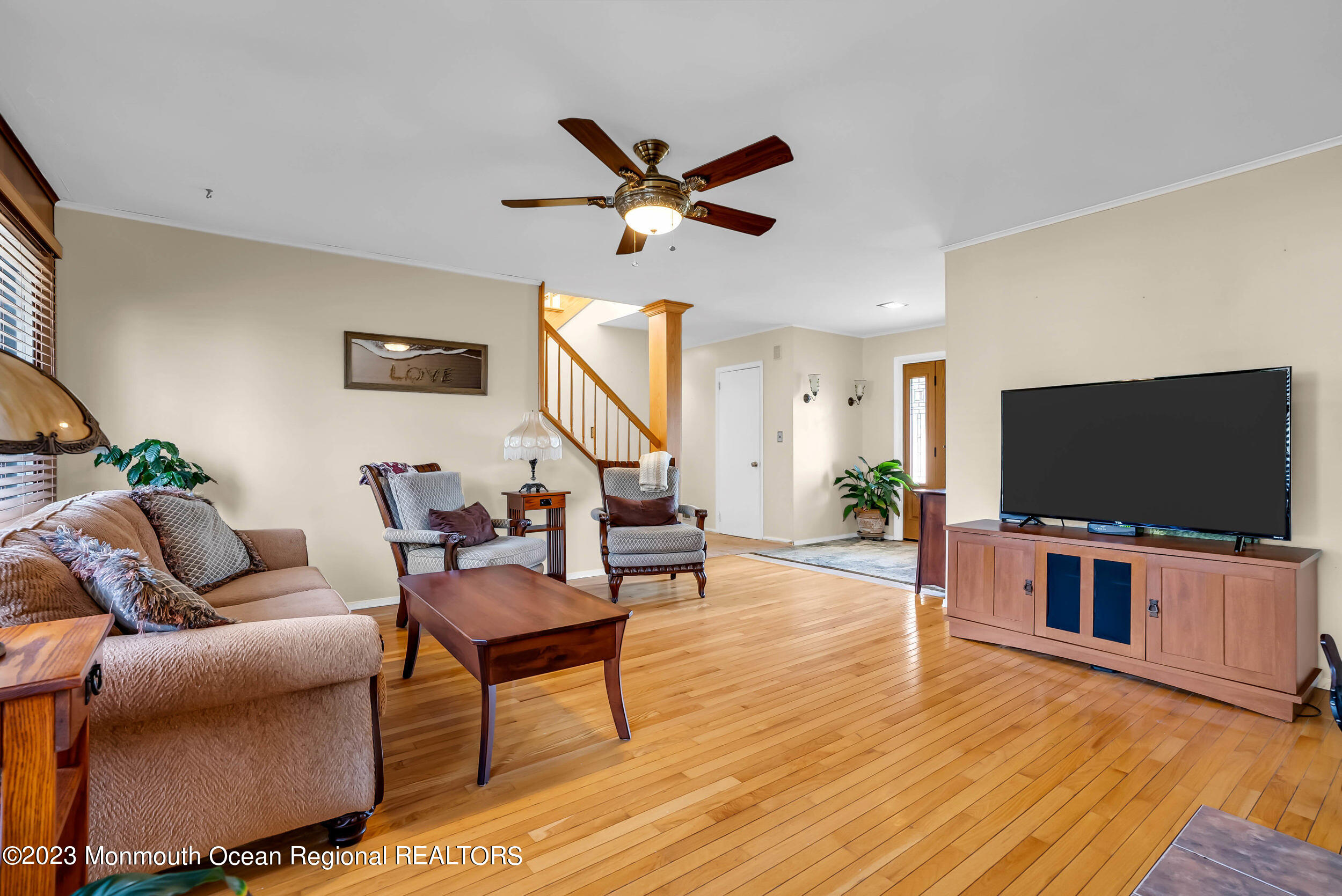 250 Cliftwood Road Oakhurst, NJ 07755 - Photo 27 of 40 a living room with furniture and a flat screen tv