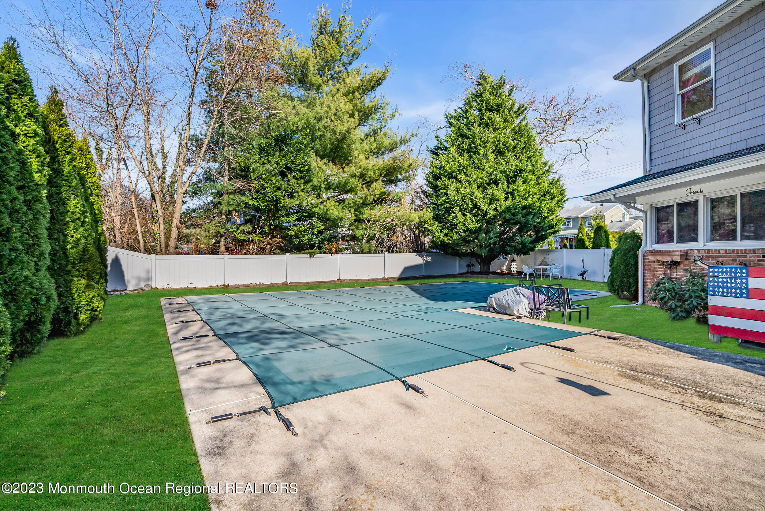 250 Cliftwood Road Oakhurst, NJ 07755 - Photo 39 of 40 a view of a backyard with a garden and plants