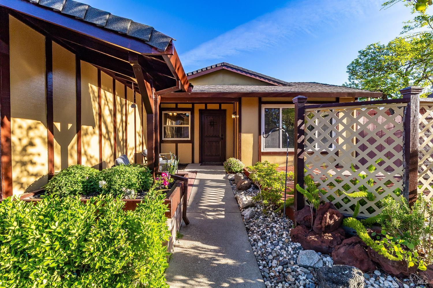 900 Seascape Circle Rodeo, CA 94572 - Photo 13 of 54 a view of a house with a large window and flower plants