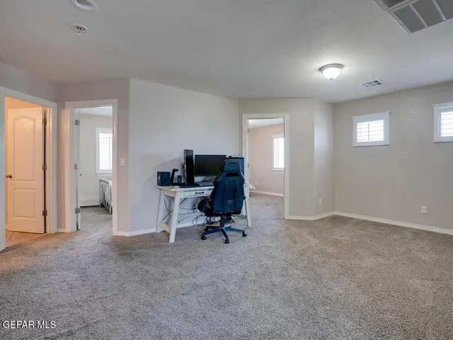 a view of workspace with livingroom