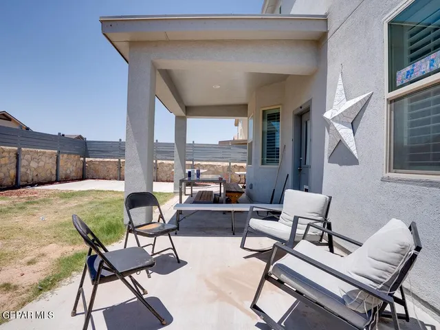 a building outdoor space with patio furniture