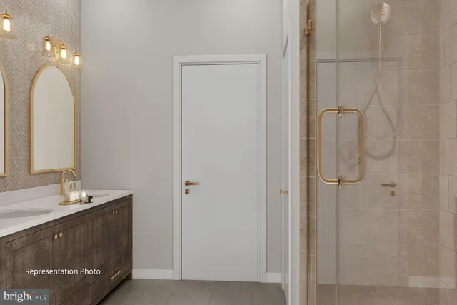 a bathroom with a double vanity sink a vanity and a mirror