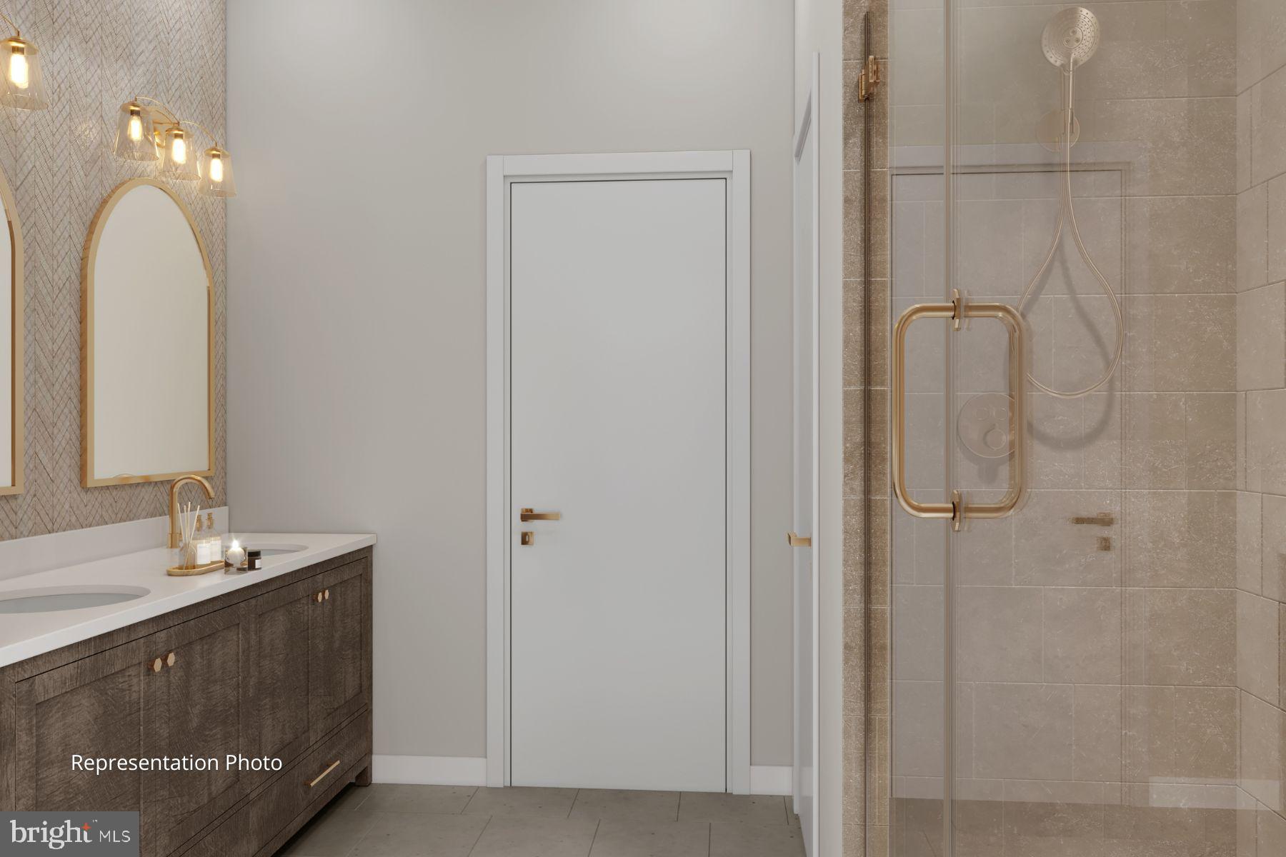 117 Blackford Boulevard, Unit 205 Lebanon, PA 17042 - Photo 9 of 10 a bathroom with a double vanity sink a vanity and a mirror