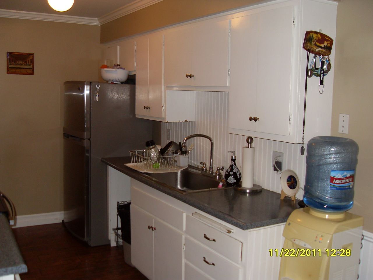 37 Dearborn Place, Unit 71 Goleta, CA 93117 - Photo 3 of 8 a kitchen with a sink and cabinets