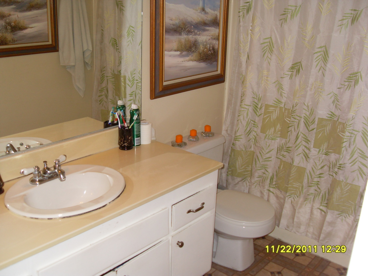 37 Dearborn Place, Unit 71 Goleta, CA 93117 - Photo 6 of 8 a bathroom with a sink and a mirror