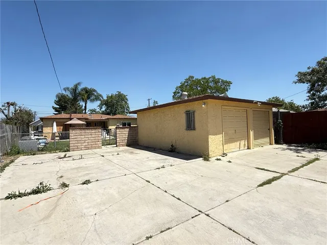 a tall building with trees in the background