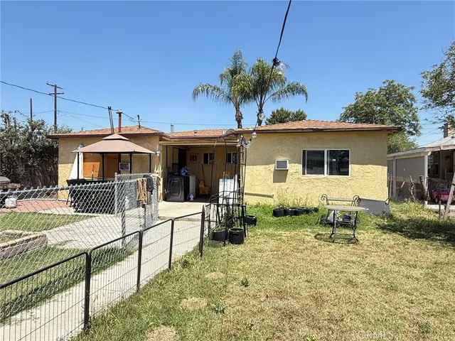 a house view with a garden space