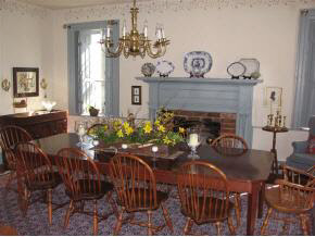 827 Berry Farm Road Verona, VA 24482 - Photo 4 of 8 a living room with furniture a chandelier and a fireplace