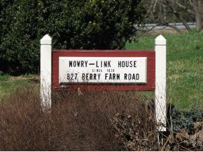 827 Berry Farm Road Verona, VA 24482 - Photo 5 of 8 a sign that is sitting on a brick wall