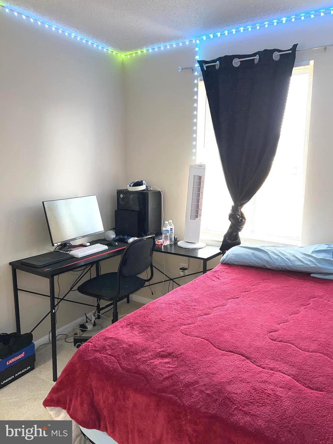 1132 West Side Drive, Unit 32B Gaithersburg, MD 20878 - Photo 34 of 51 a bedroom with a bed and a potted plant