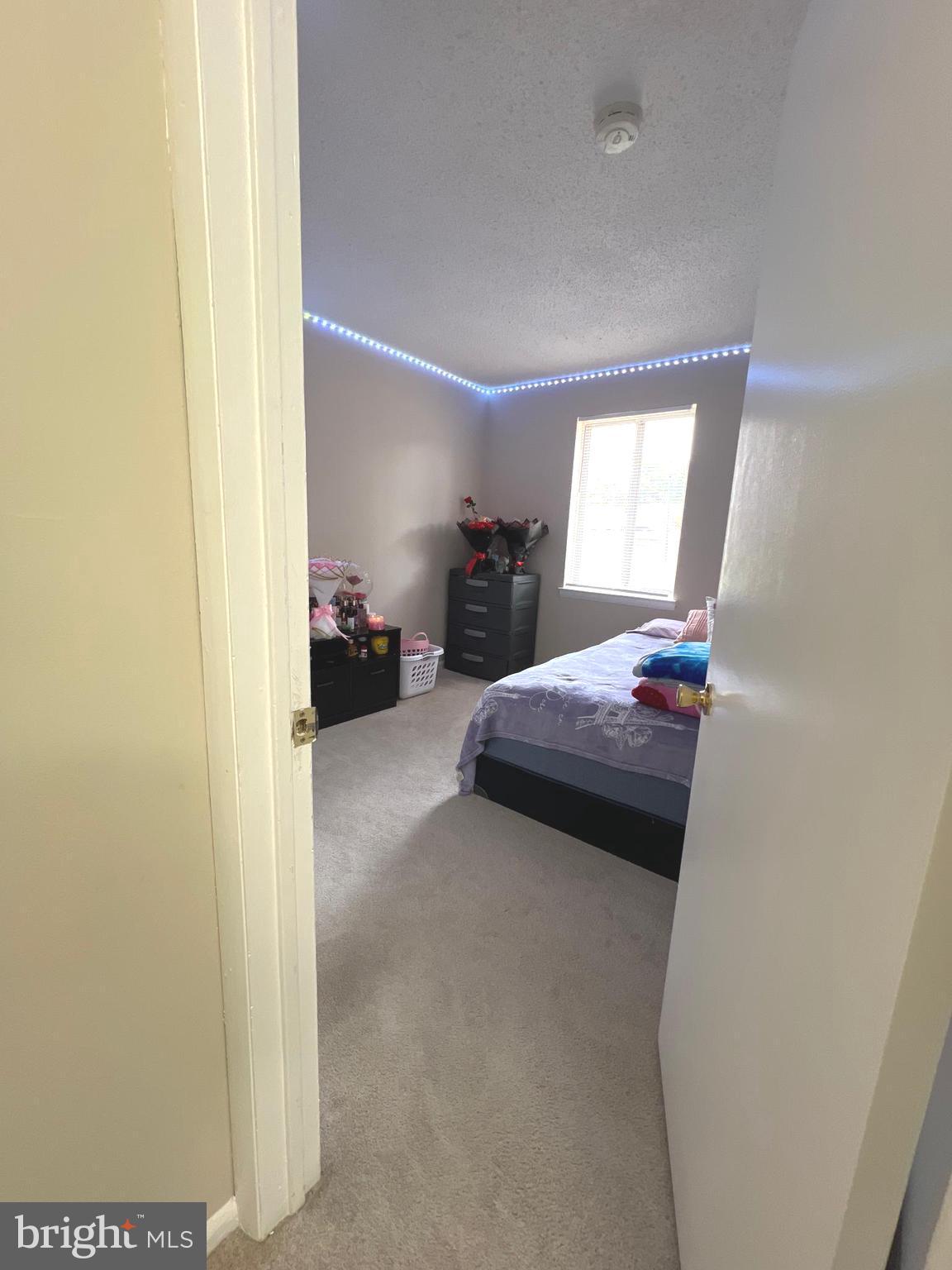 1132 West Side Drive, Unit 32B Gaithersburg, MD 20878 - Photo 36 of 51 a bed room with a bed and a window