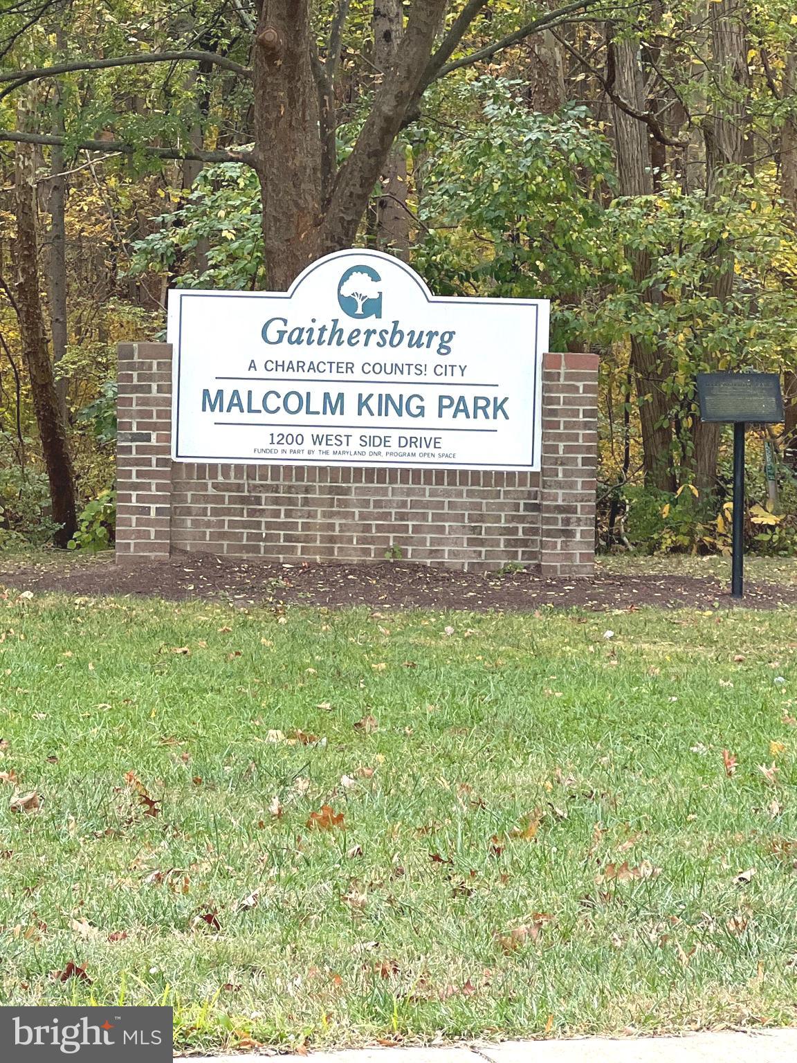 1132 West Side Drive, Unit 32B Gaithersburg, MD 20878 - Photo 45 of 51 a sign on the side of a building