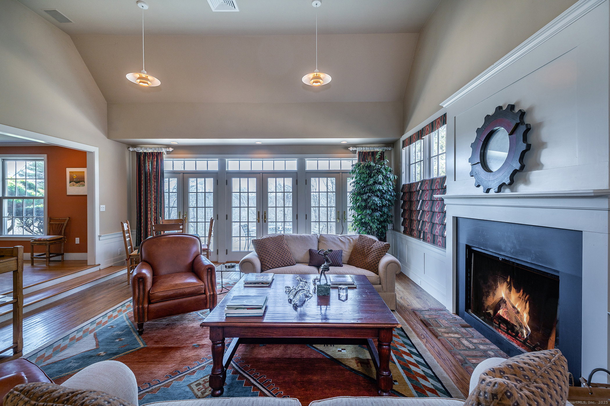 196 Baldwin Hill Road Washington, CT 06777 - Photo 11 of 28 a living room with furniture and a fireplace