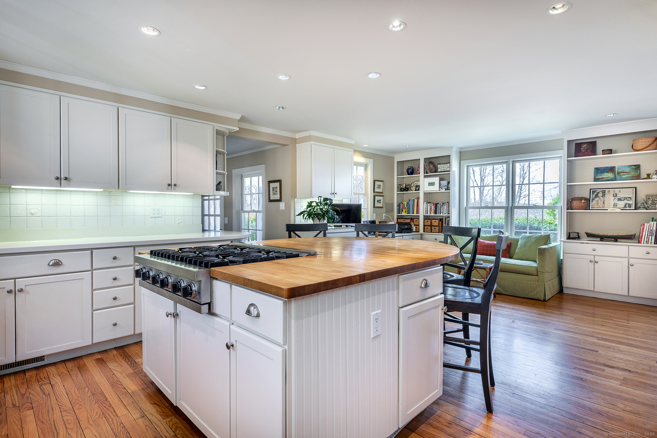 196 Baldwin Hill Road Washington, CT 06777 - Photo 14 of 28 a kitchen with granite countertop a stove and chairs