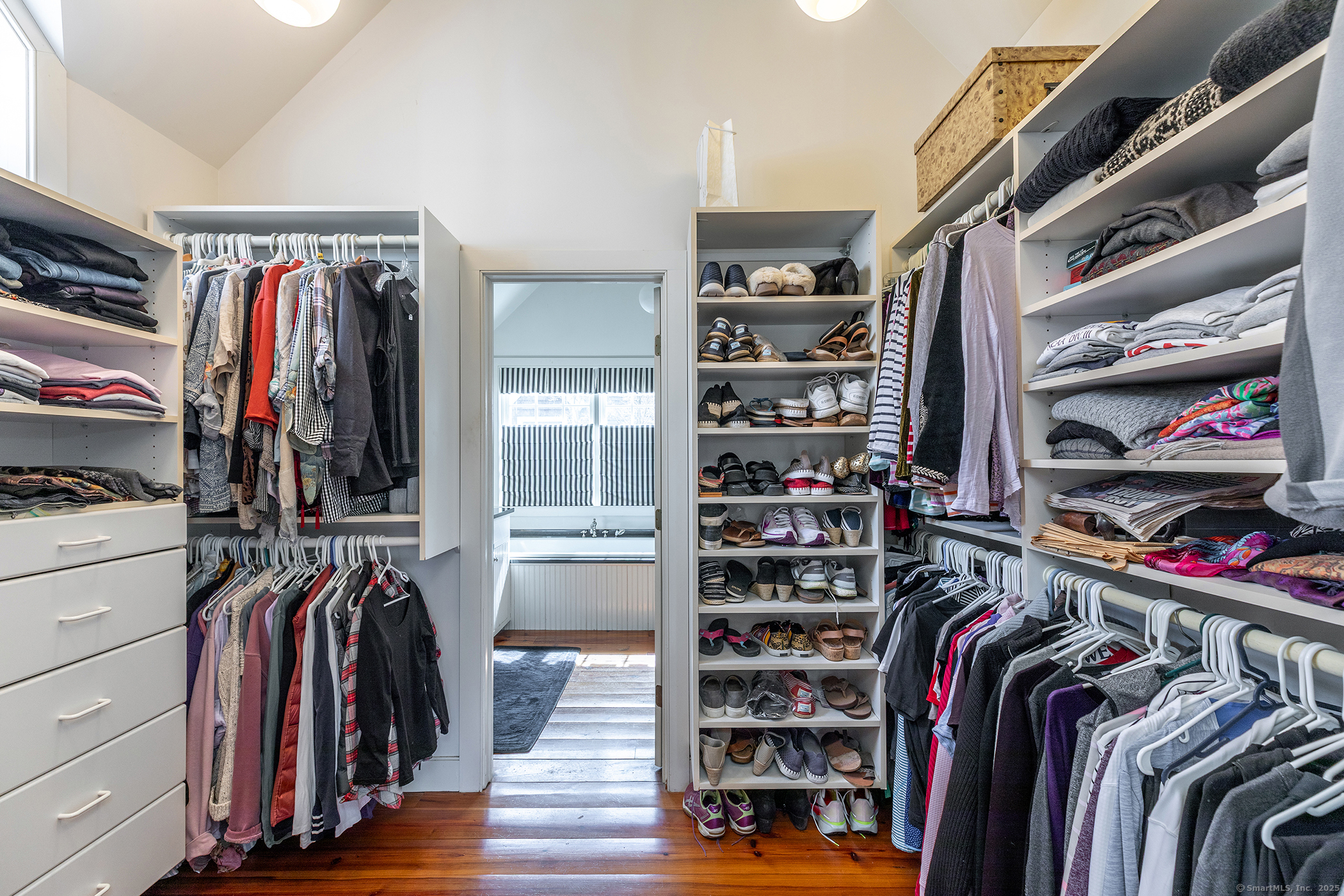 196 Baldwin Hill Road Washington, CT 06777 - Photo 21 of 28 a view of walk in closet with clothes and shoes