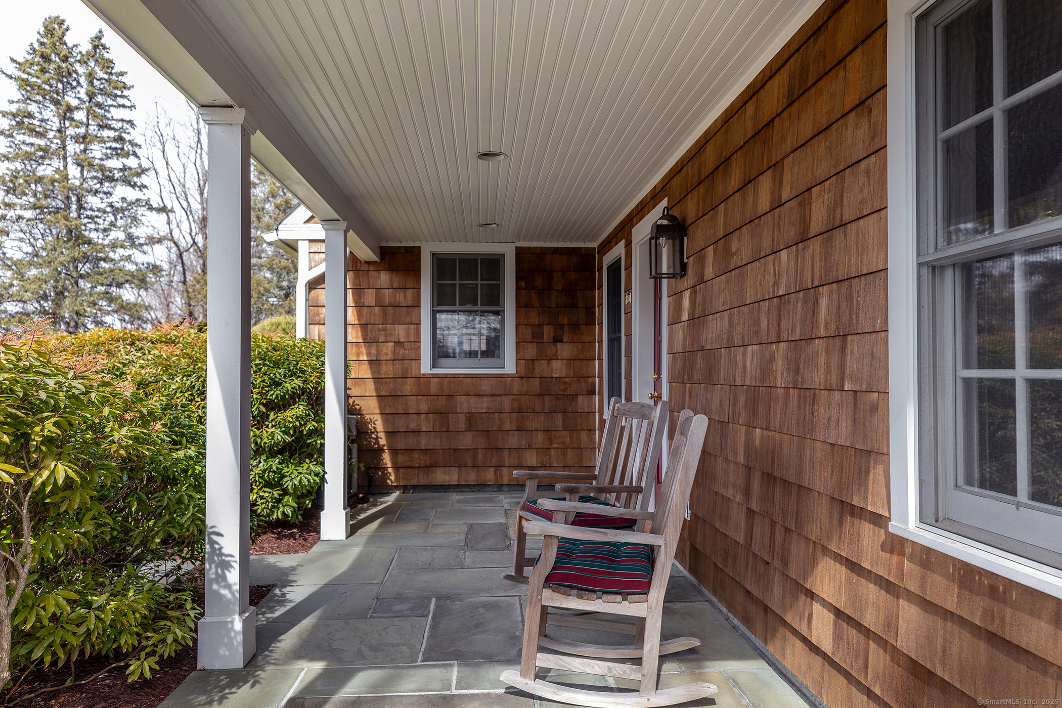196 Baldwin Hill Road Washington, CT 06777 - Photo 8 of 28 a view of chair in the balcony with wooden floor