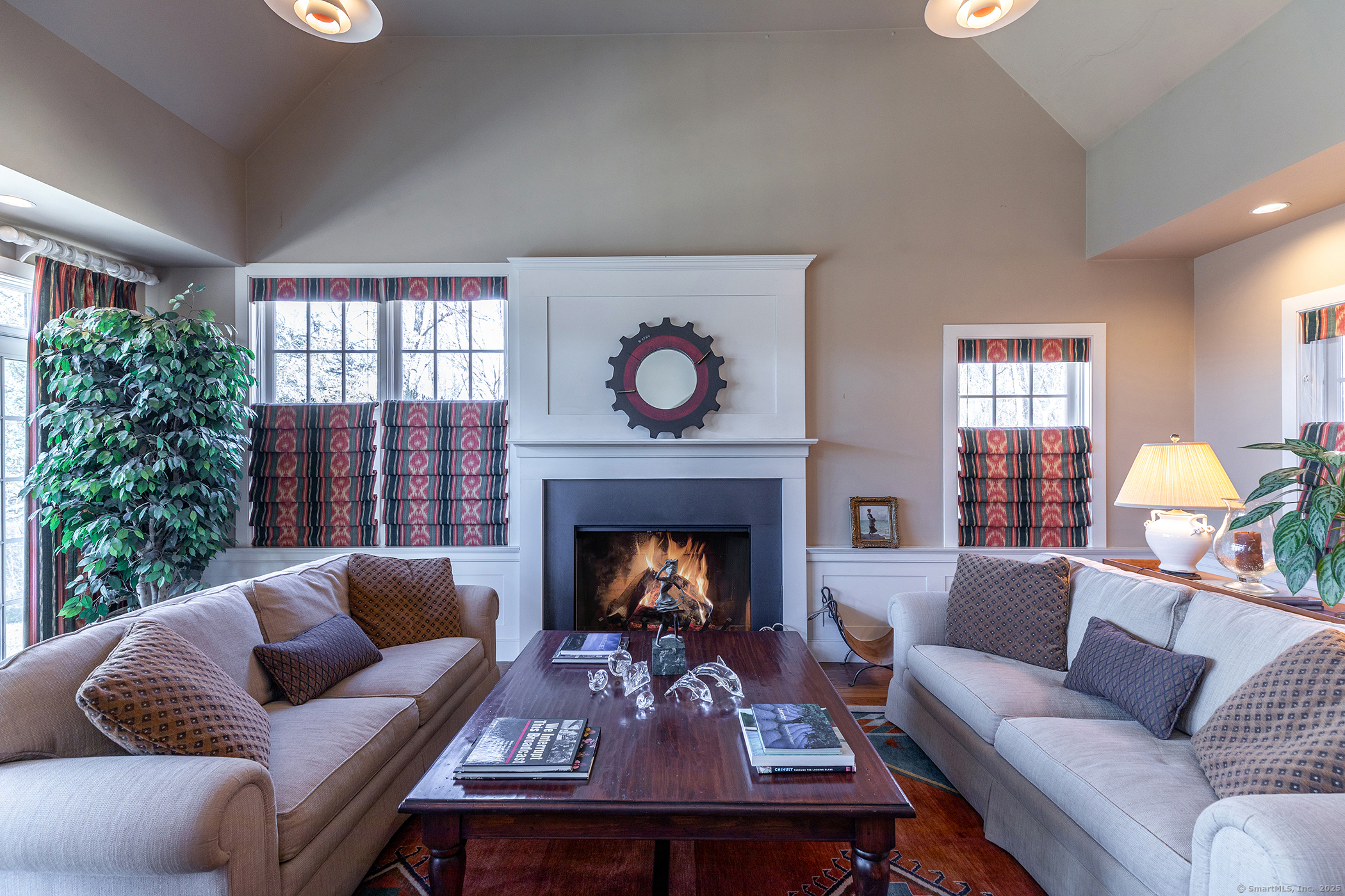 196 Baldwin Hill Road Washington, CT 06777 - Photo 9 of 28 a living room with furniture and a fireplace