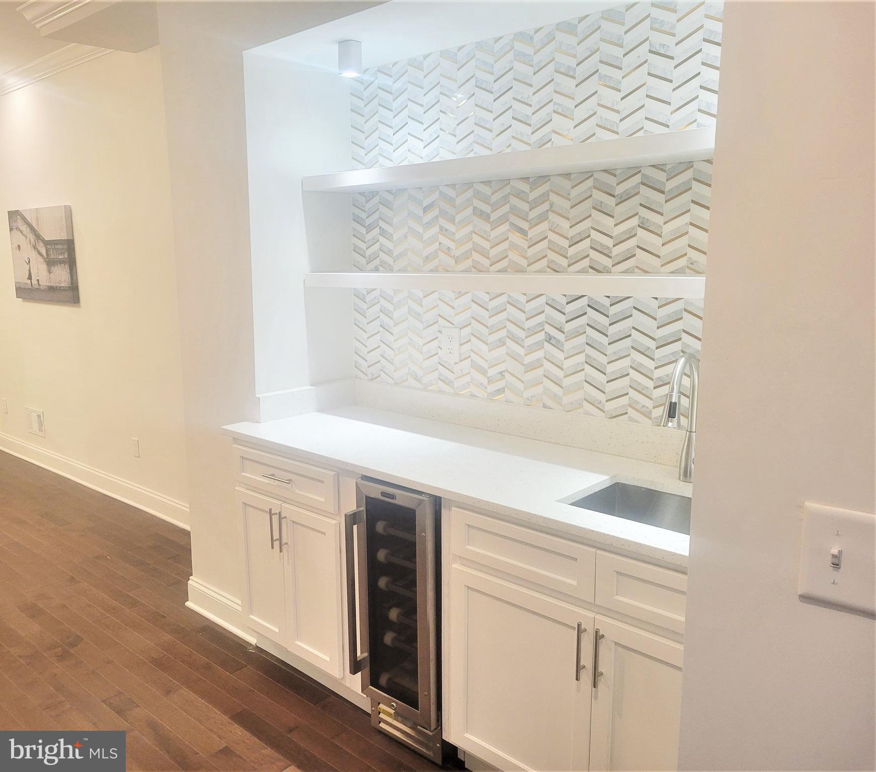2040 East Preston Street Baltimore, MD 21213 - Photo 7 of 16 Wet Bar with bottle cooler