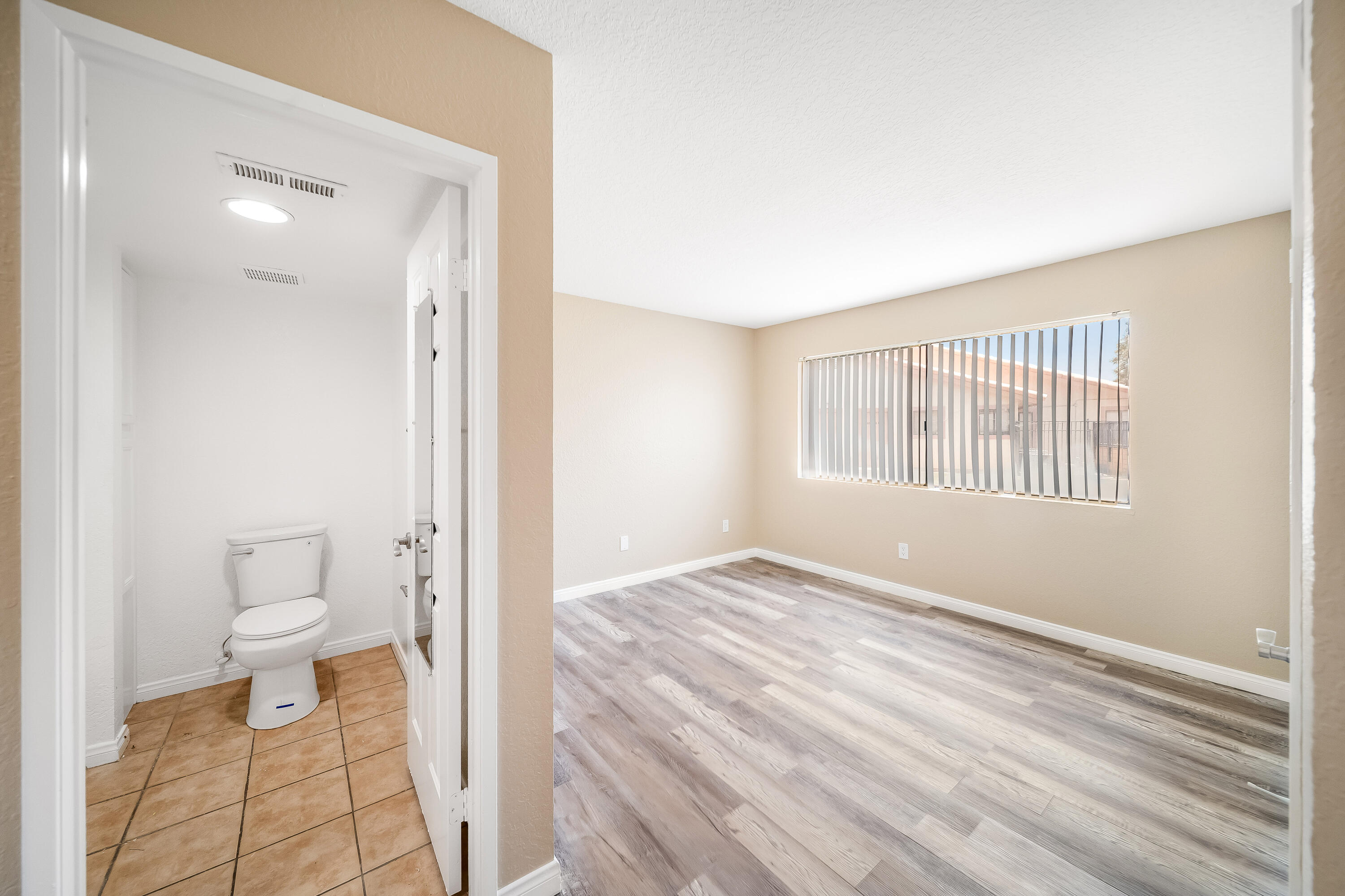 78650 Ave 42, Unit 1407 Bermuda Dunes, CA 92203 - Photo 12 of 20 a bathroom with a toilet and a window