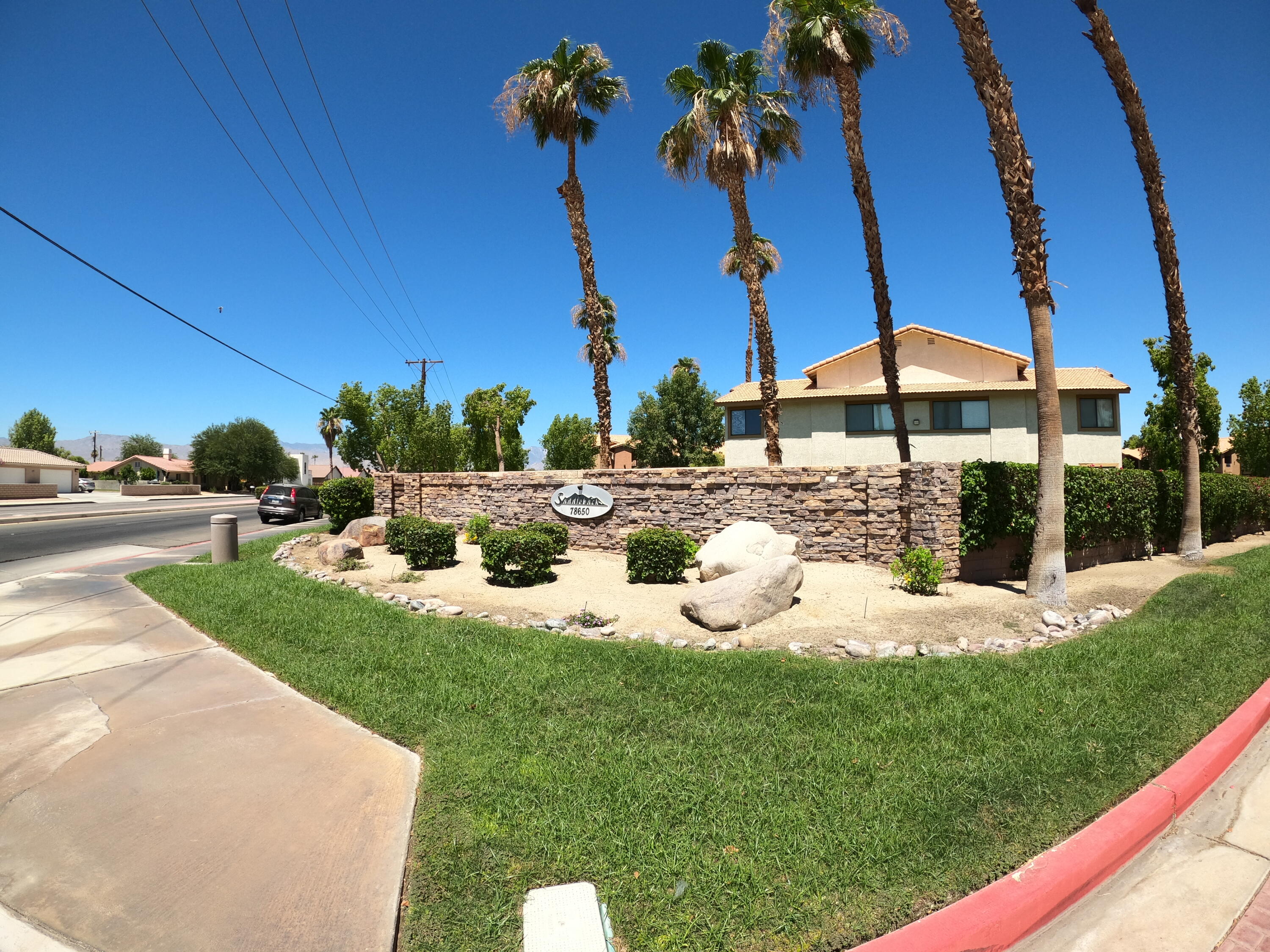 78650 Ave 42, Unit 1407 Bermuda Dunes, CA 92203 - Photo 20 of 20 a view of a backyard with sitting area