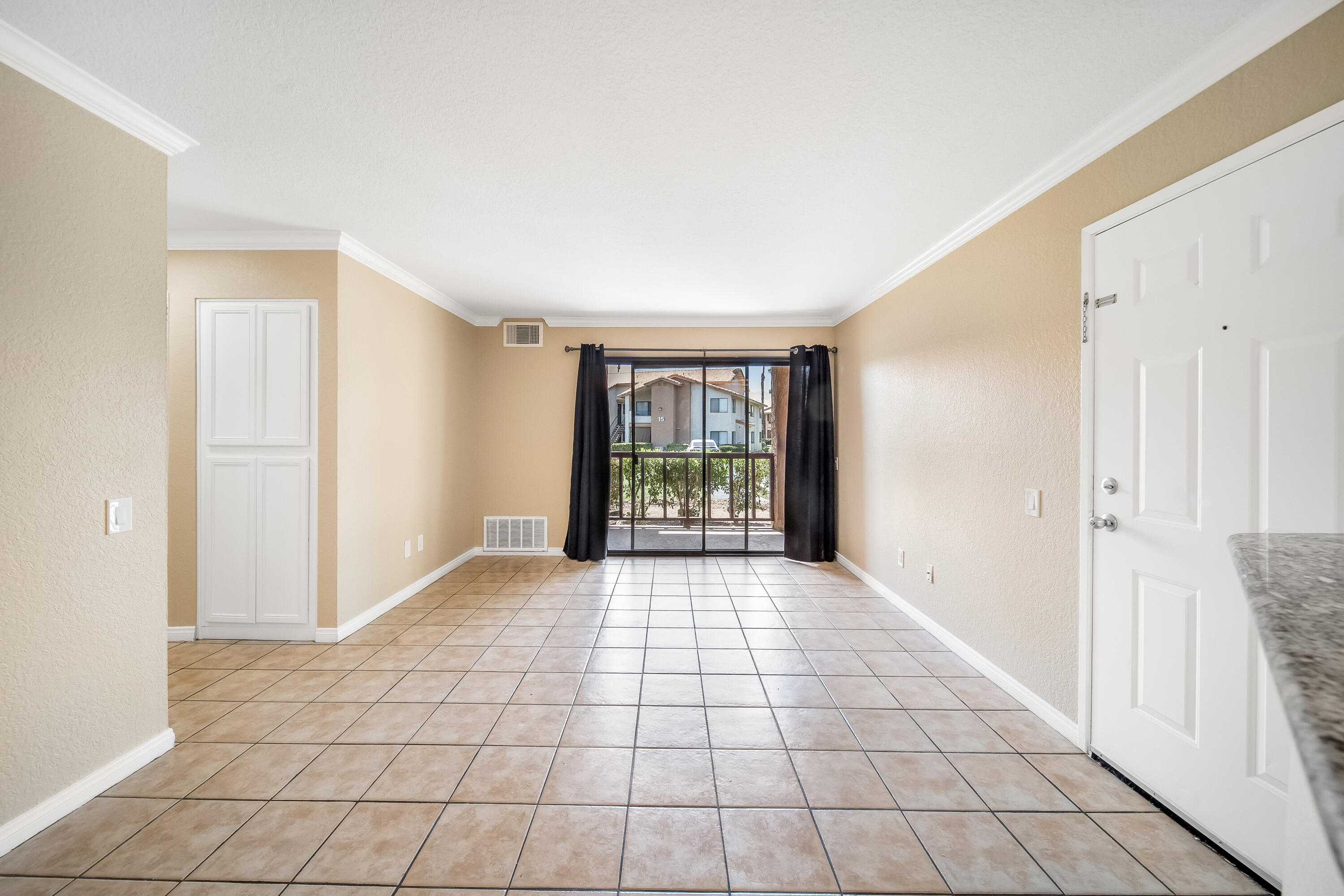 78650 Ave 42, Unit 1407 Bermuda Dunes, CA 92203 - Photo 4 of 20 a view of an empty room with windows