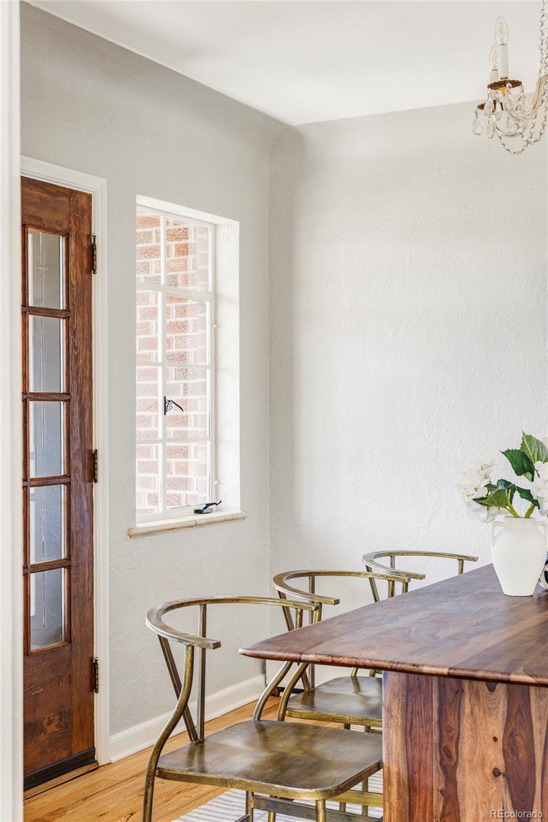 1201 Fairfax Street Denver, CO 80220 - Photo 11 of 40 a room with furniture and wooden floor