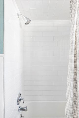 a bathroom with a bathtub